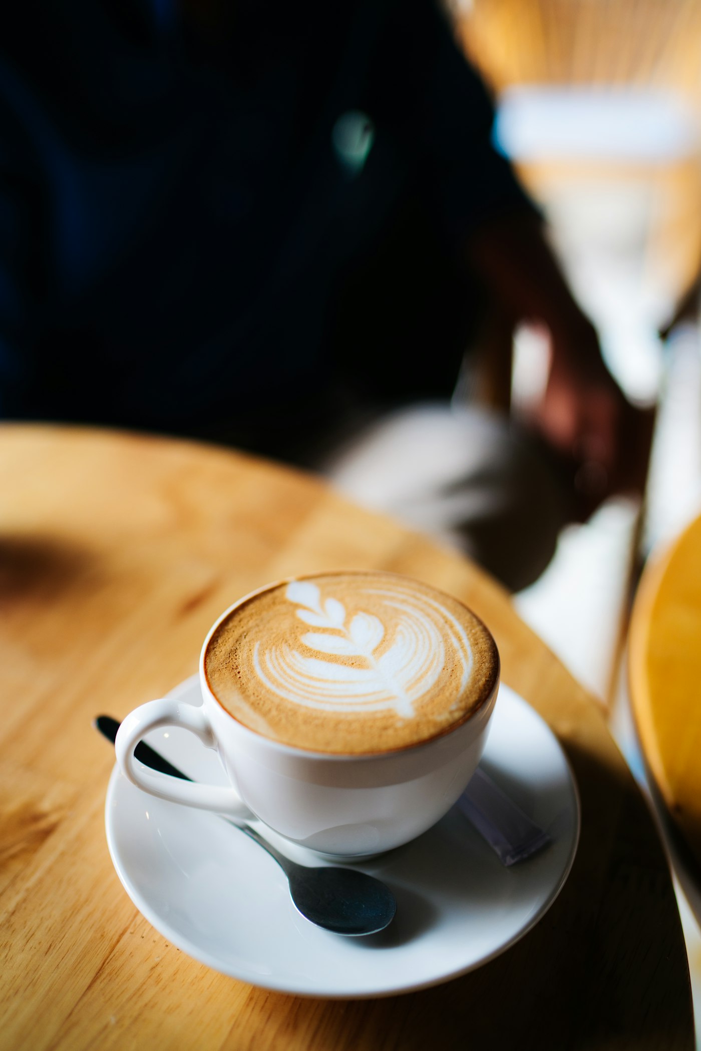 A cappuccino on a café table