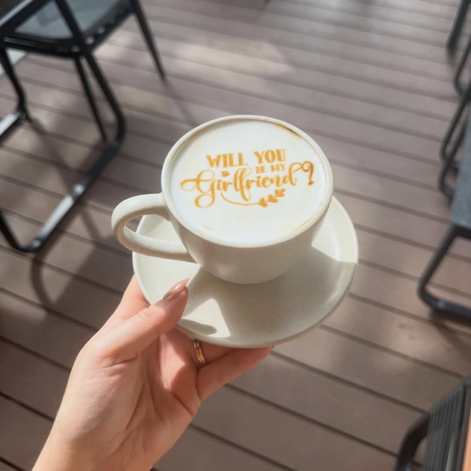 A latte with a personal message printed on the foam